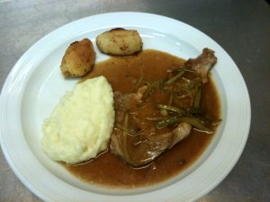 Côte de porc charcutière 